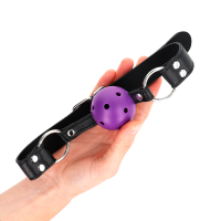 Bâillon boule respirant violet à double rivet